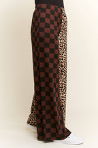 SPLIT DECISION LEOPARD-CHECKERED PANTS