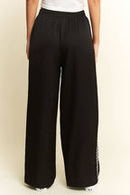 SOLID SATIN SWEATPANTS WITH SIDE CHECKERBOARD TAPE