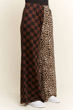 SPLIT DECISION LEOPARD-CHECKERED PANTS