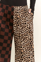 SPLIT DECISION LEOPARD-CHECKERED PANTS